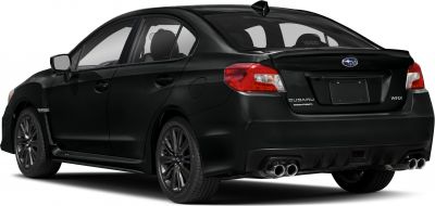 Rear and side view of a sedan with quad exhaust and sporty alloy wheels