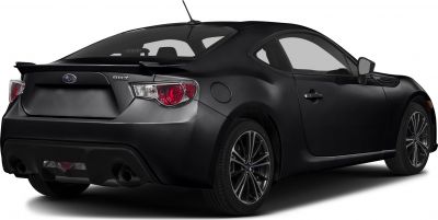 Rear view of sporty coupe with spoiler and alloy wheels