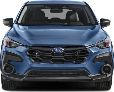 Hexagonal front grille with sleek headlights and fog lights.