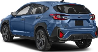 Rear and side profile with distinctive tail lights and alloy wheels