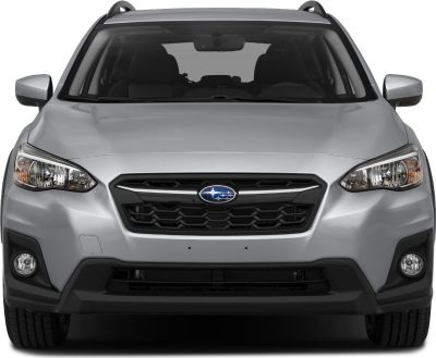 Front grille and headlights of silver SUV with roof rails