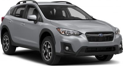 Silver crossover SUV with roof rails and bold front grille