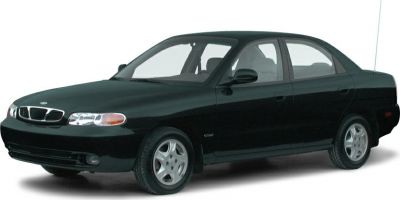 Classic 1990s sedan with four doors and streamlined body shape