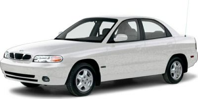 Compact sedan with smooth body and distinct grille from front-side angle