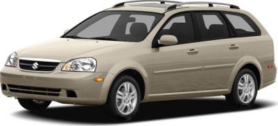Beige wagon with roof rails and alloy wheels side view