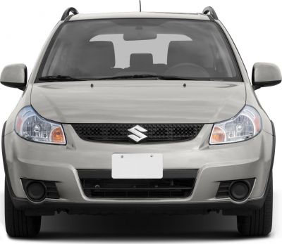 Front view of a vehicle highlighting grille, headlights, and fog lights