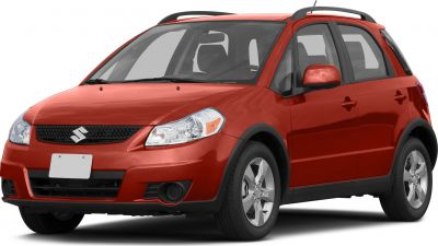 Front-side view of red compact crossover with alloy wheels and roof rails