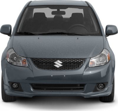 Front view showing headlights, grille, emblem, and fog lights