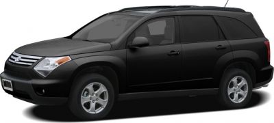 Side profile of 2007 SUV with black body and alloy wheels