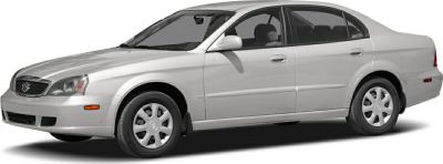 Side view of a 2003 mid-size sedan with streamlined body and alloy wheels