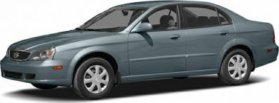 Front-side view of a blue mid-size sedan with body lines and wheel design.