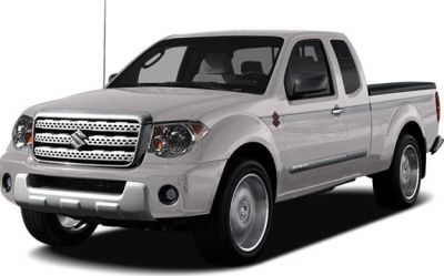 White pickup truck with extended cab, front and side view