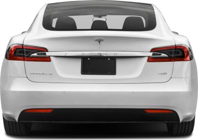 Rear view with distinctive LED taillights and Tesla badge.