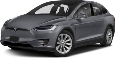 Front side view of gray electric SUV with sleek headlights and alloy wheels