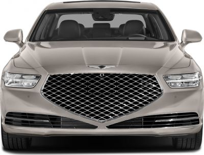 Front view of a luxury sedan with diamond mesh grille and sleek LED headlights