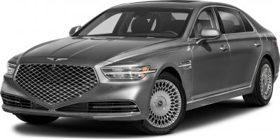 Large distinctive grille and intricate alloy wheels on luxury sedan.