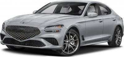Front view of silver luxury sedan with mesh grille and alloy wheels