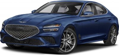 Blue sedan with large mesh grille and sporty alloy wheels