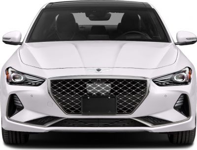 Large diamond-pattern grille and sleek LED headlights on front view.