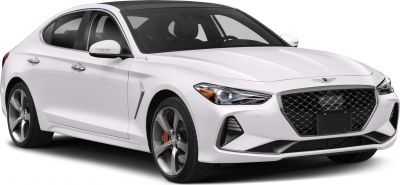 Front angle view of luxury sedan with bold grille and sleek headlights
