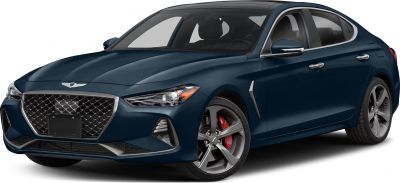Front view showing large grille and alloy wheels with red brake calipers