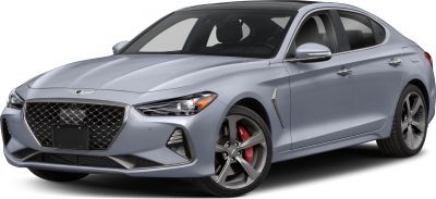 Front angle with diamond-pattern grille and alloy wheels with red brake calipers