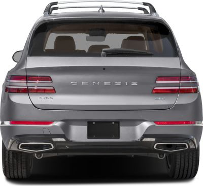 Rear view with dual exhaust, distinctive taillights, and roof rails