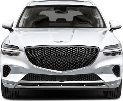 Front view with large mesh grille and slim LED headlights