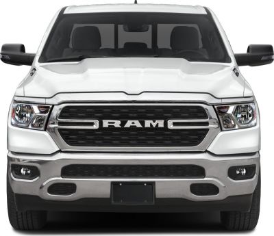 Front view with bold grille and headlights of a pickup truck