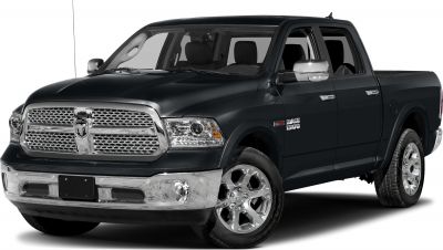 Chrome grille and bumper with polished wheels on crew cab pickup truck.