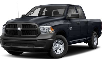 Front grille, headlights, and side doors of pickup truck
