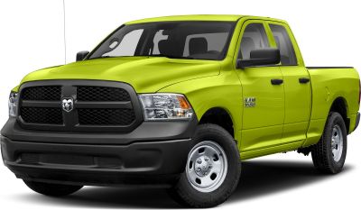 Front and side view of a pickup truck with black grille and steel wheels