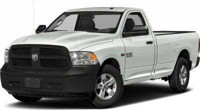 Front side view of a white pickup truck with long bed and regular cab.