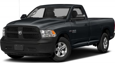 Robust front grille, headlights, and extended cab side profile of pickup