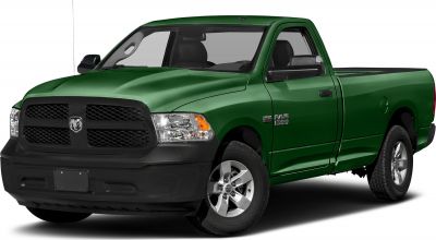 Green pickup truck front-side view with black grille and alloy wheels