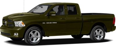 Side profile of a quad cab pickup truck with alloy wheels and bold grille.
