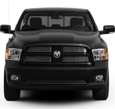 Front grille and headlights of a black pickup truck