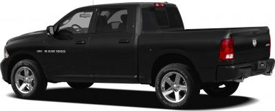 Extended cab pickup with long bed, chrome wheels, and dual exhaust