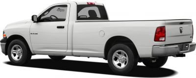 White regular cab pickup truck with long cargo bed side profile
