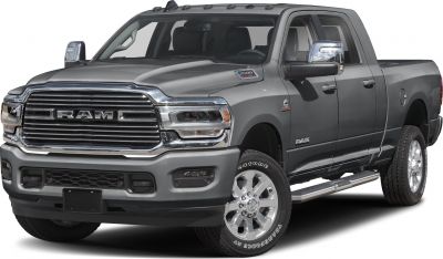 Heavy-duty pickup truck front and side with large grille and chrome accents