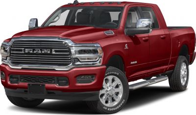Front view of a heavy duty pickup with chrome grille and red body