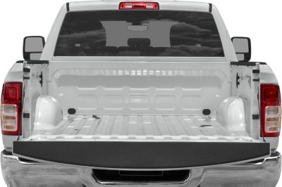 Open pickup truck bed with chrome bumper and red tail lights