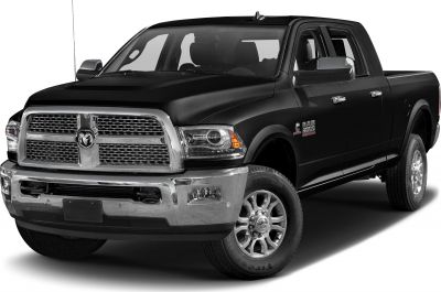 Front view of a black heavy duty pickup with chrome grille and large tires
