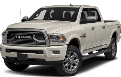 Front grille and crew cab side of a large pickup truck with chrome detailing.