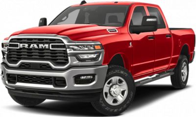 Heavy-duty pickup front view with prominent grille and extended cab