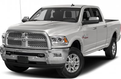 Front and side view of a heavy-duty Crew Cab pickup with large grille and chrome bumper.