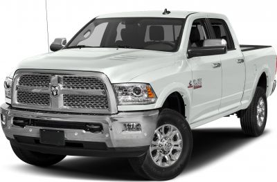 Front view with chrome grille, headlights, and rugged wheels.