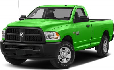 Front side view of a pickup with prominent grille and headlights