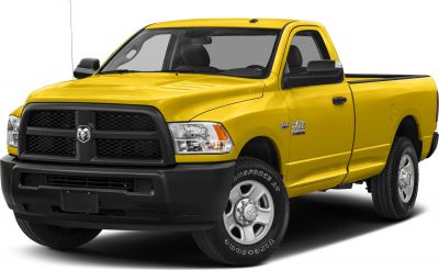 Yellow regular cab pickup with black grille and alloy wheels.