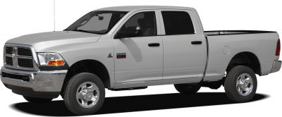 Side view of heavy duty crew cab long pickup with chrome bumper.